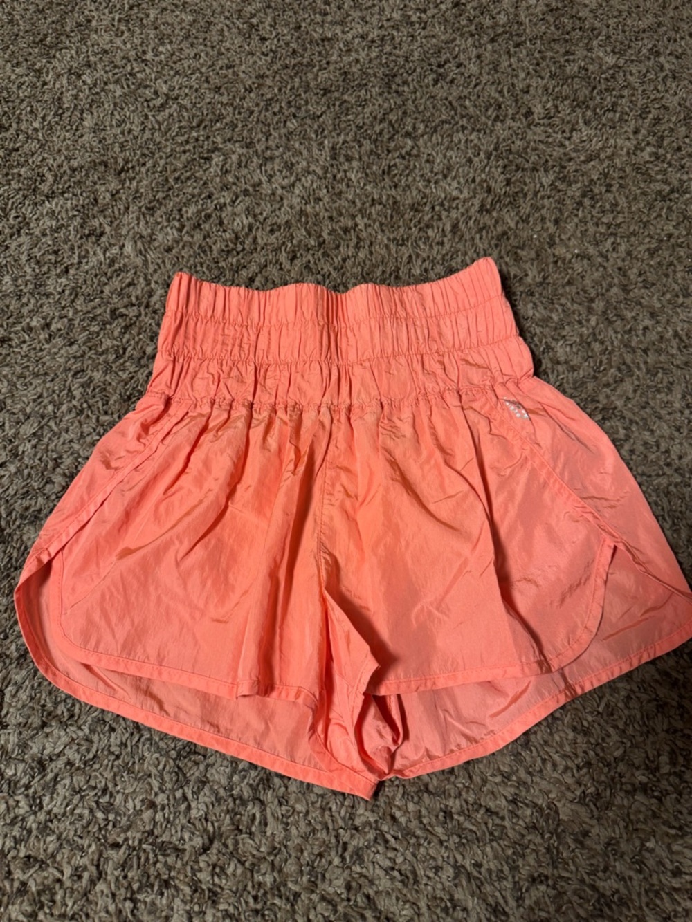 Free People High-Waist Smocked Athletic Shorts in Coral